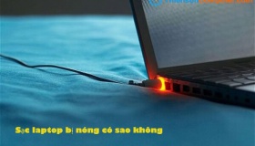 Sạc laptop bị nóng có sao không